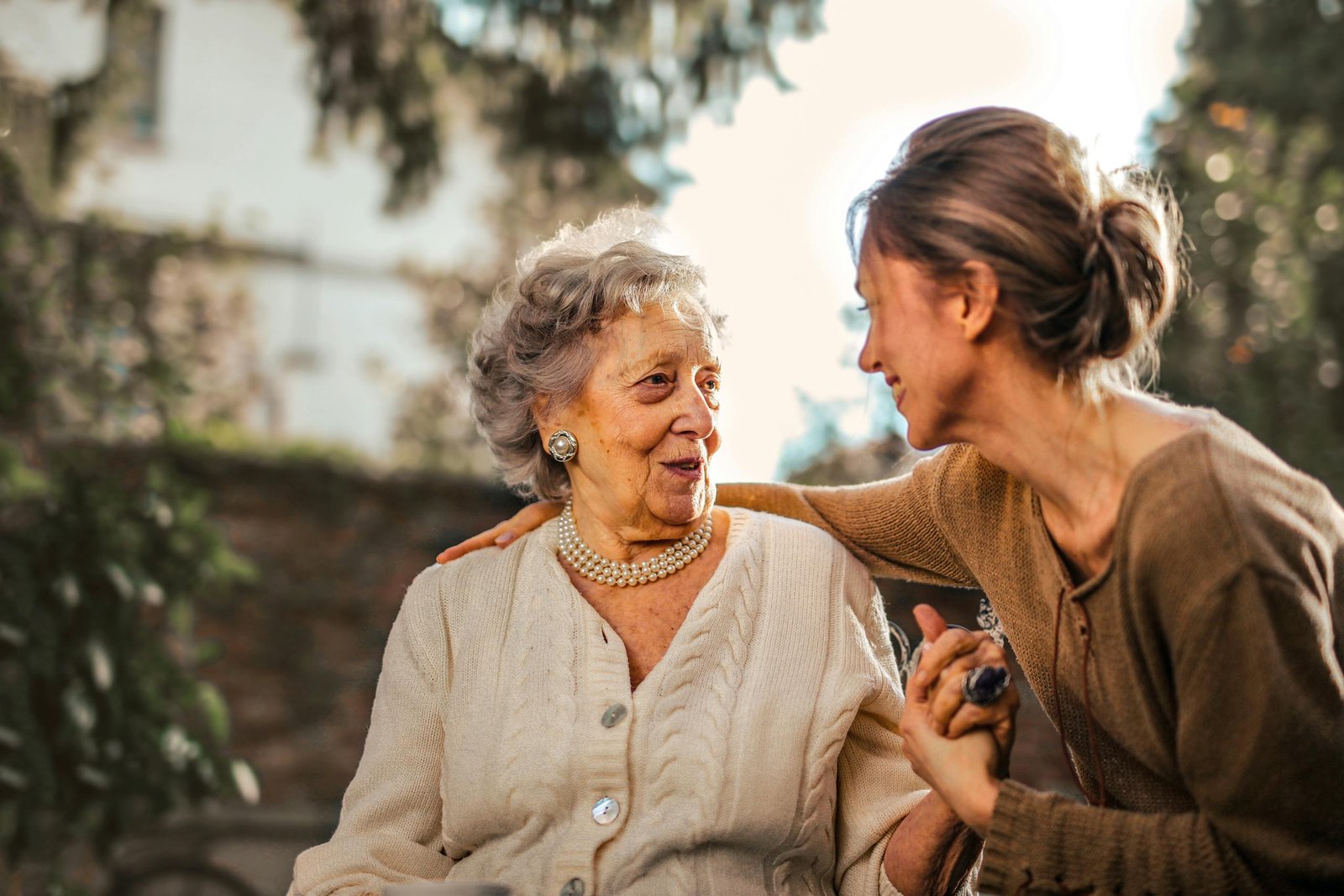 Caregiver enjoys a moment in the garden with her mother