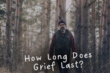 Man walking with a dog in the woods with the text "how long does grief last"